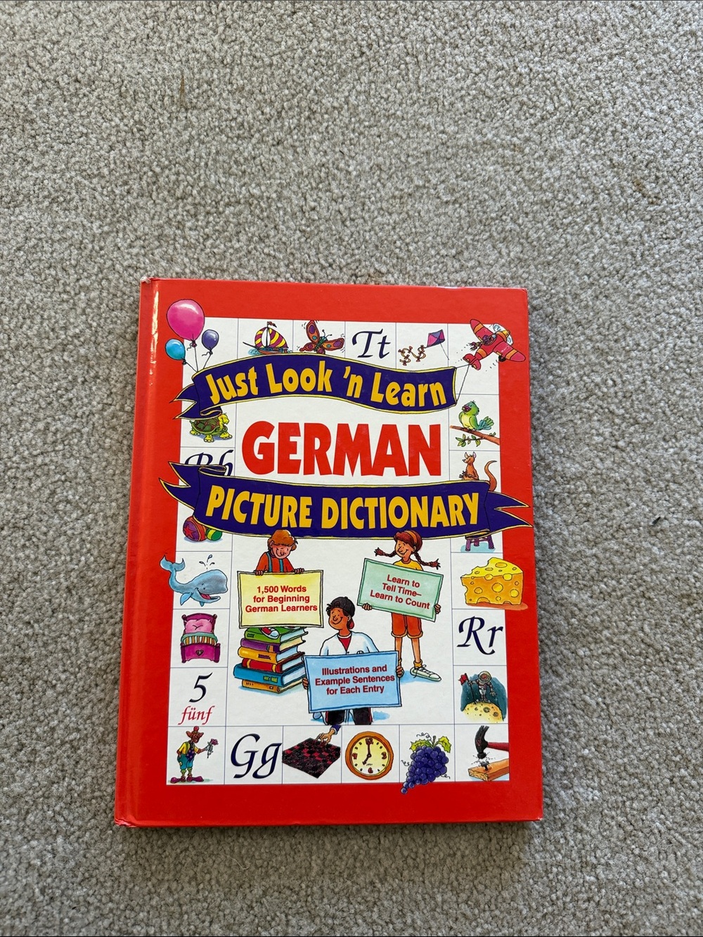 Just Look 'n Learn German Picture Dictionary by Daniel J. Hochstatter.